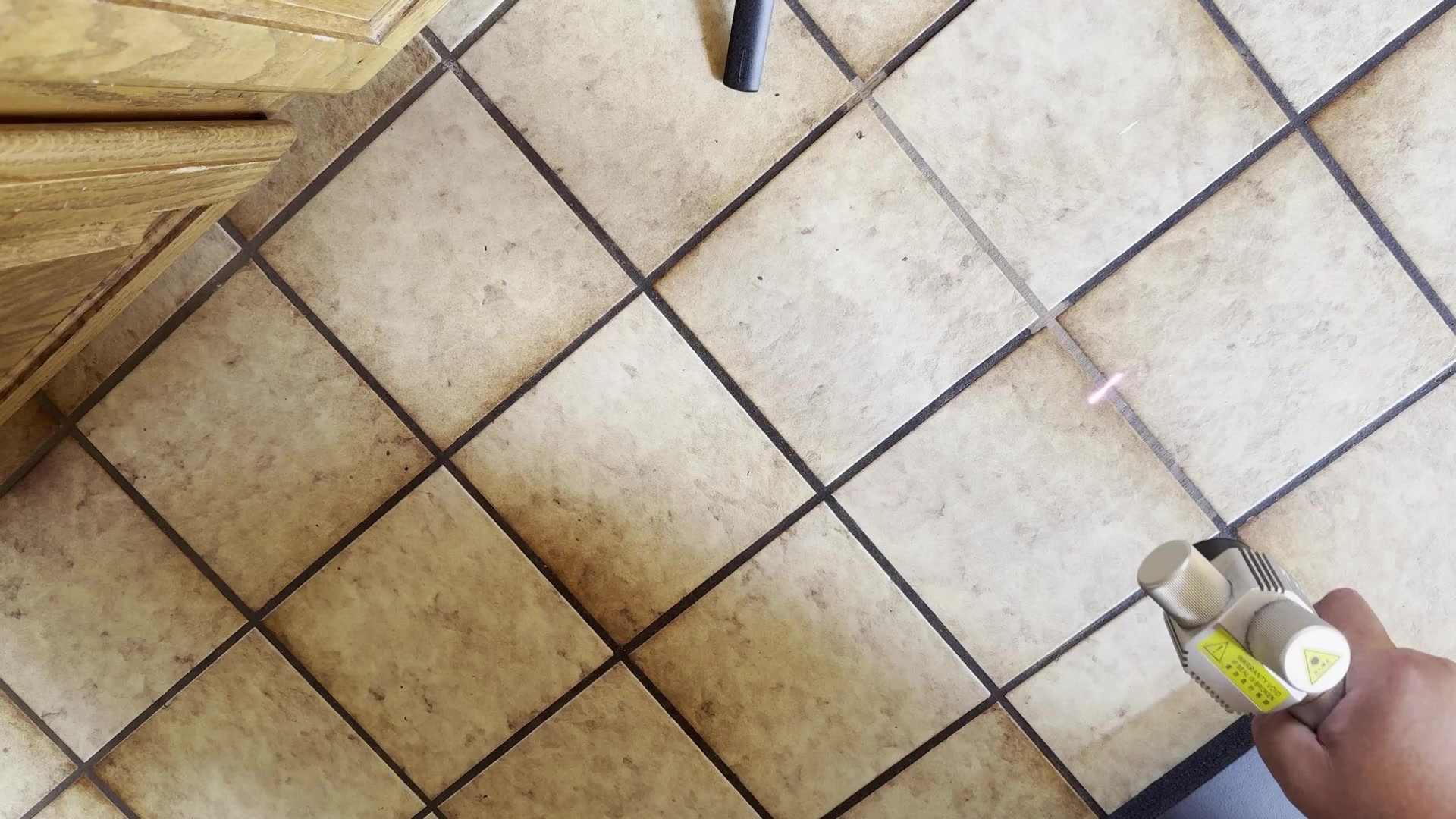 Tile floor laser cleaning